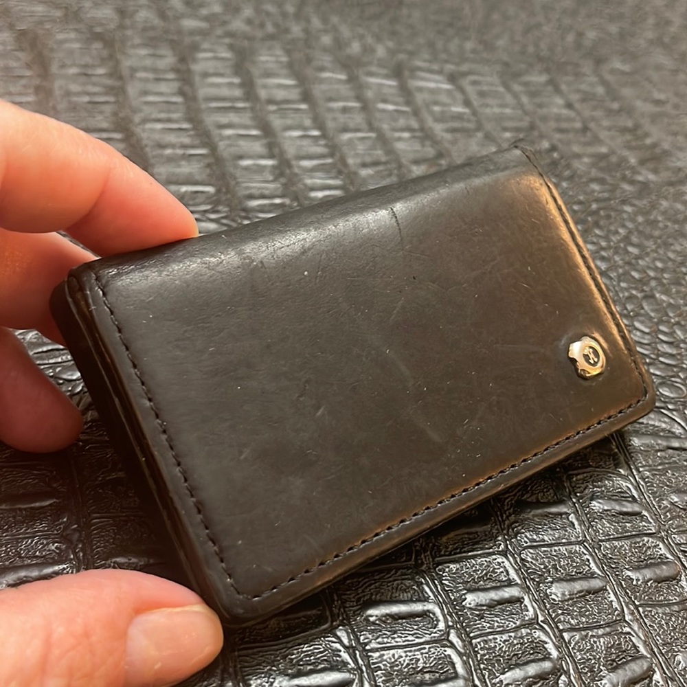 Cole Haan Black Leather Card Holder 
Foldover closure- magnetic closure